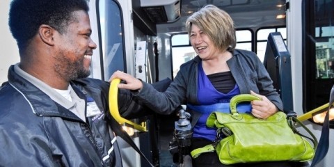 Wheelchair user exiting a paratransit vehicle