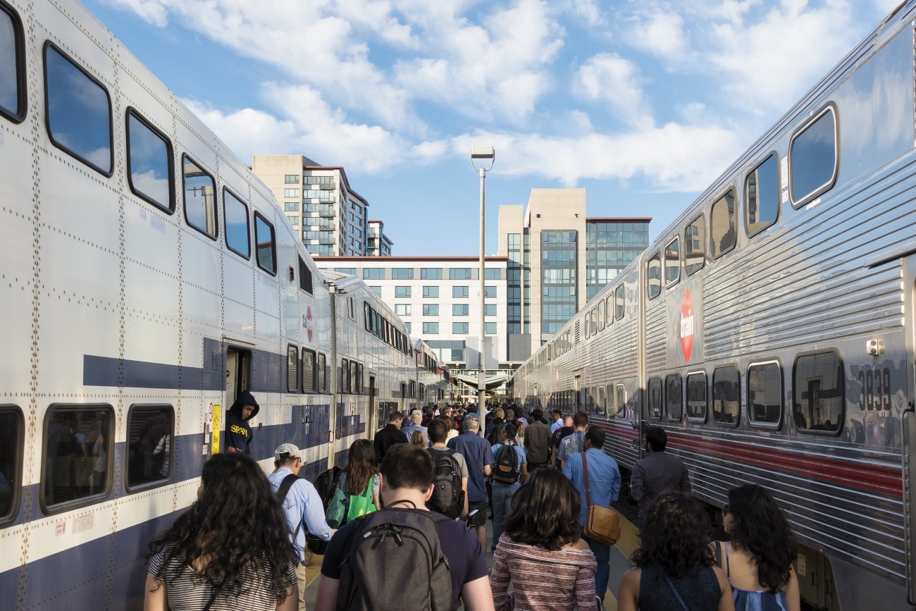 People exiting a Caltrain vehicle