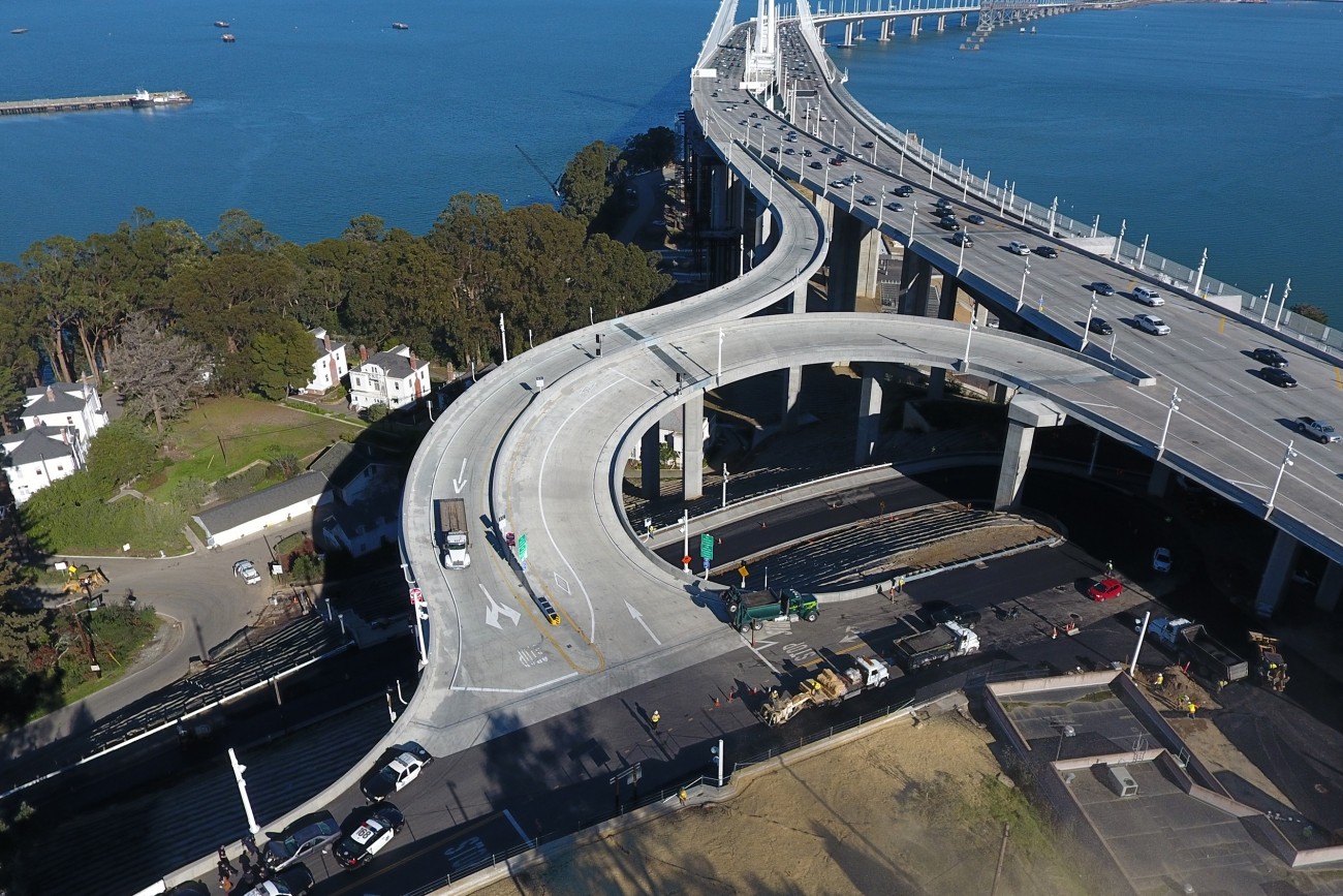 an aerial image of a freeway ramp existing the Bay Bridge 