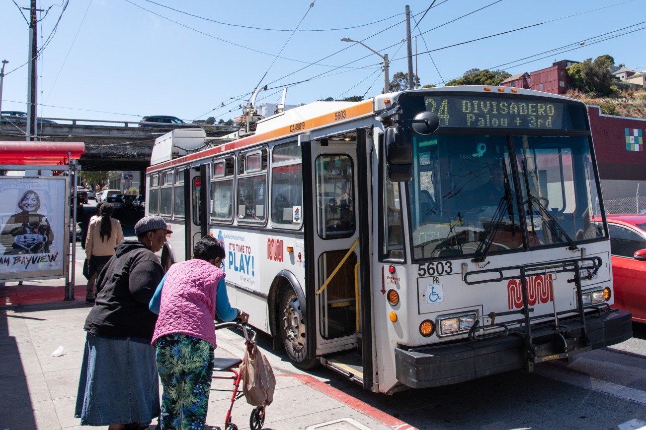 People boarding a 24 bus in the Bayview