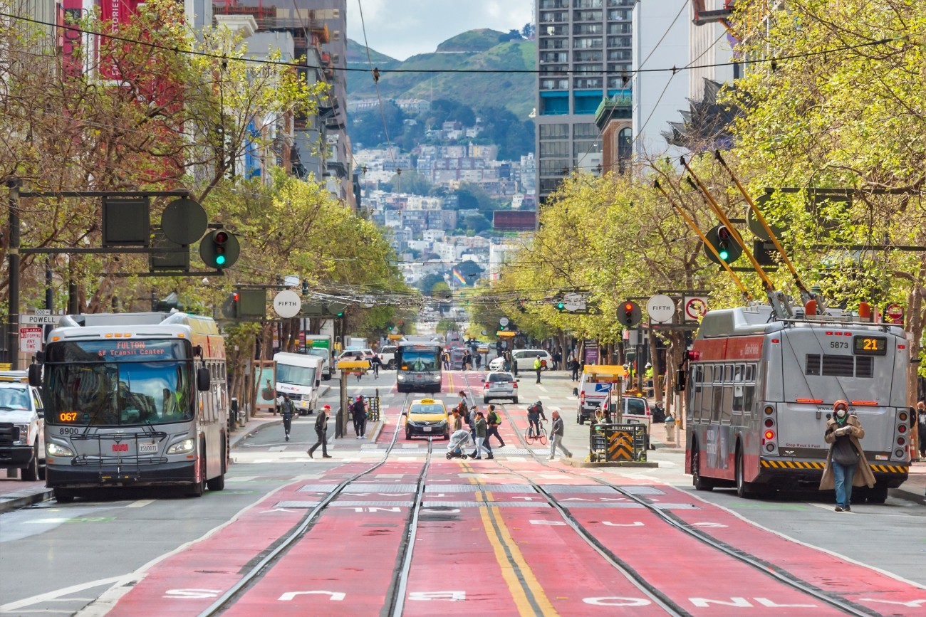 Market Street, with buses and people walking and biking