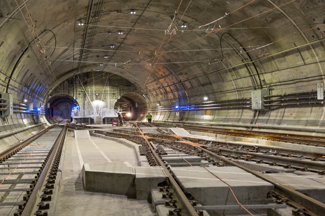 Photo of tracks entering two Central Subway tunnels