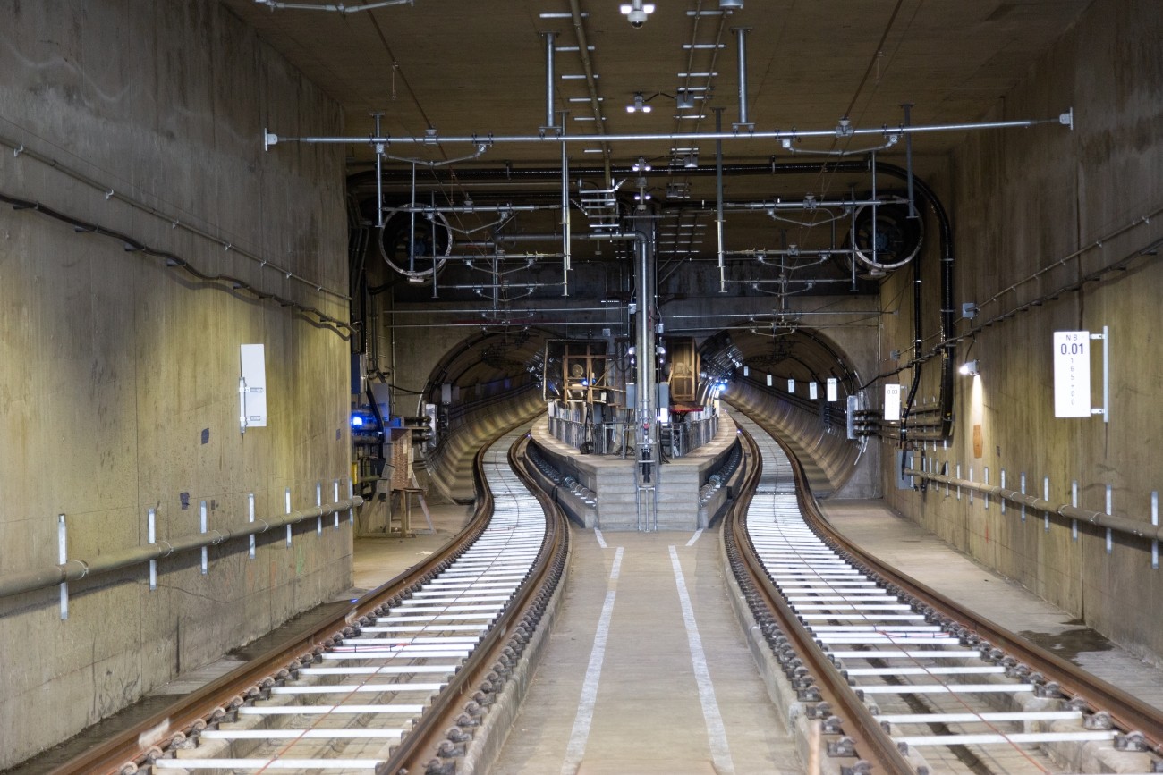 Photo of a pair of subway tracks in a tunnel