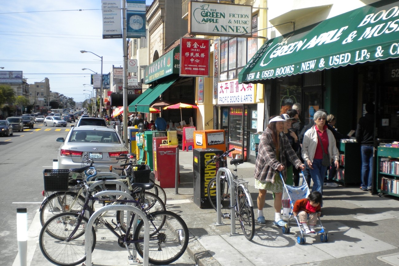 People walking on Clement past Green Apple bookstore 