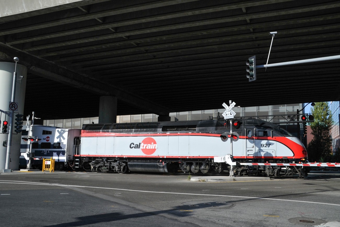 Caltrain train at a railroad crossing