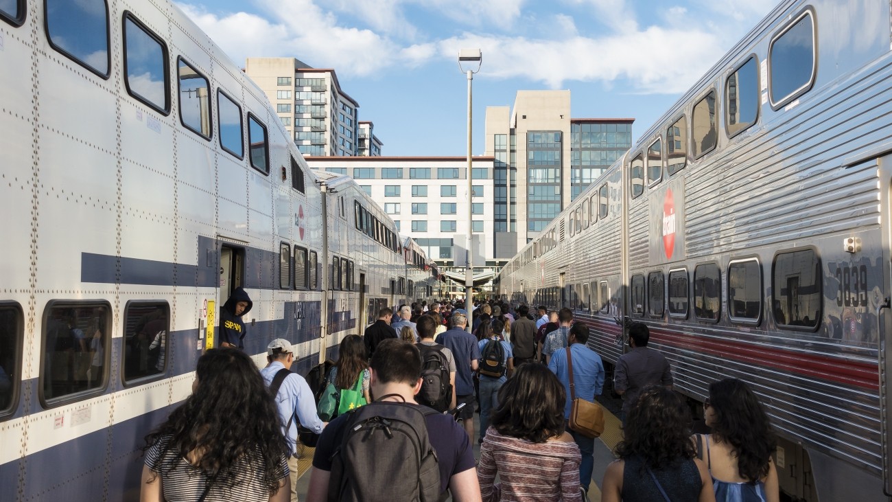 People exiting a Caltrain vehicle