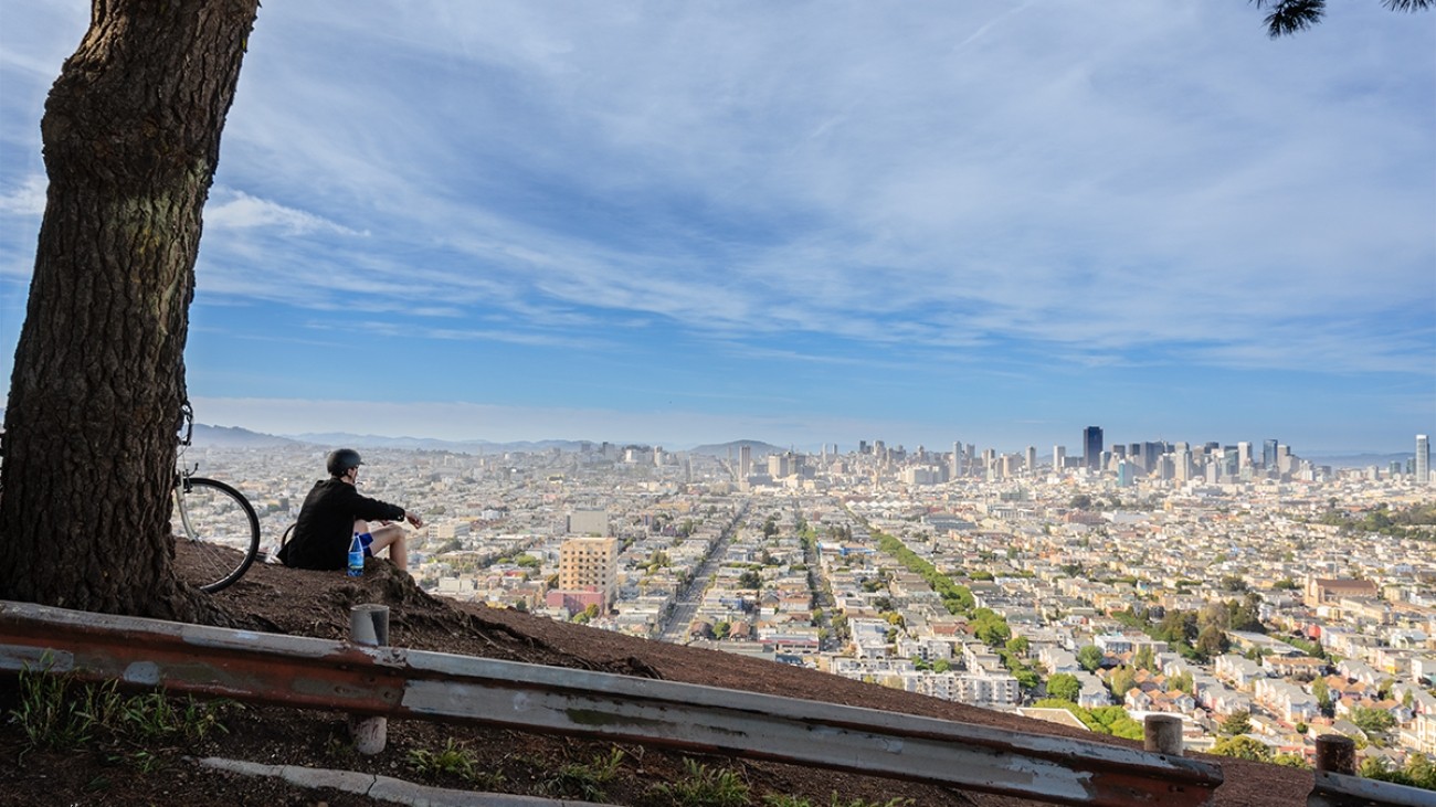 A bicyclist at the Bernal overlook