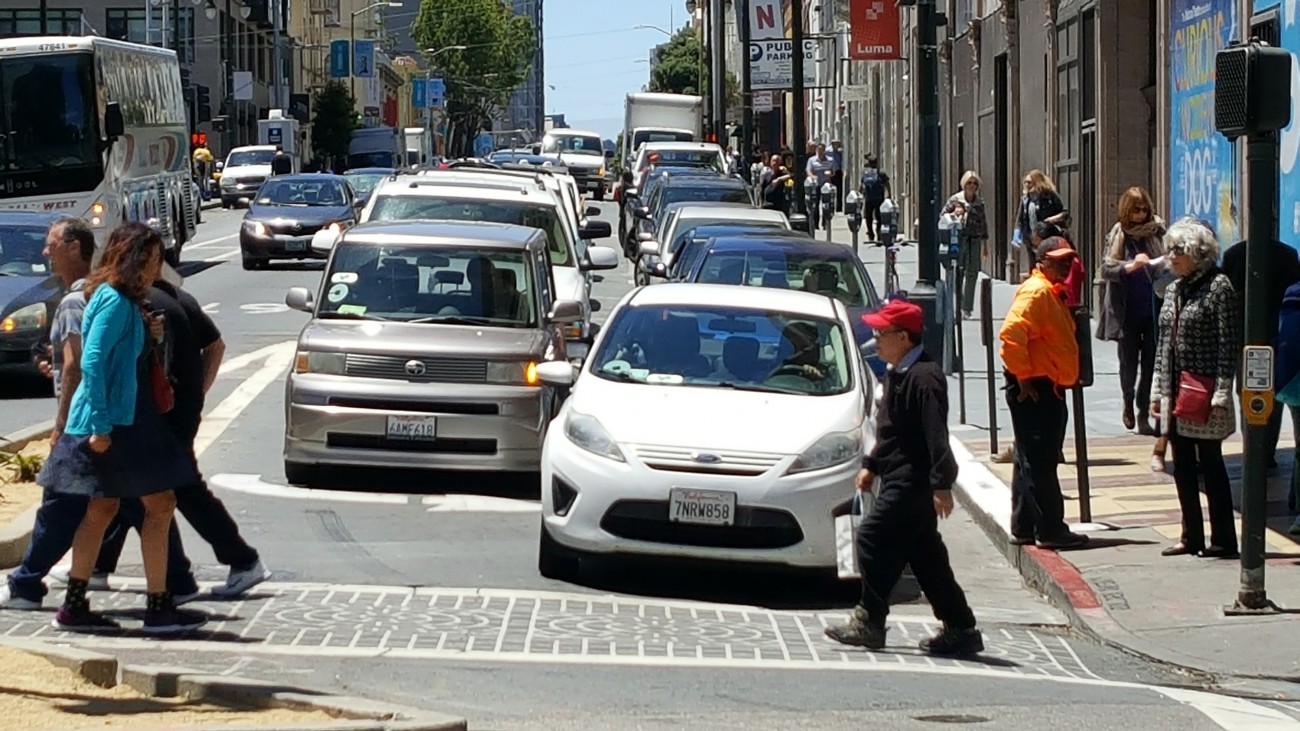 Pedestrians and ride-hail vehicles