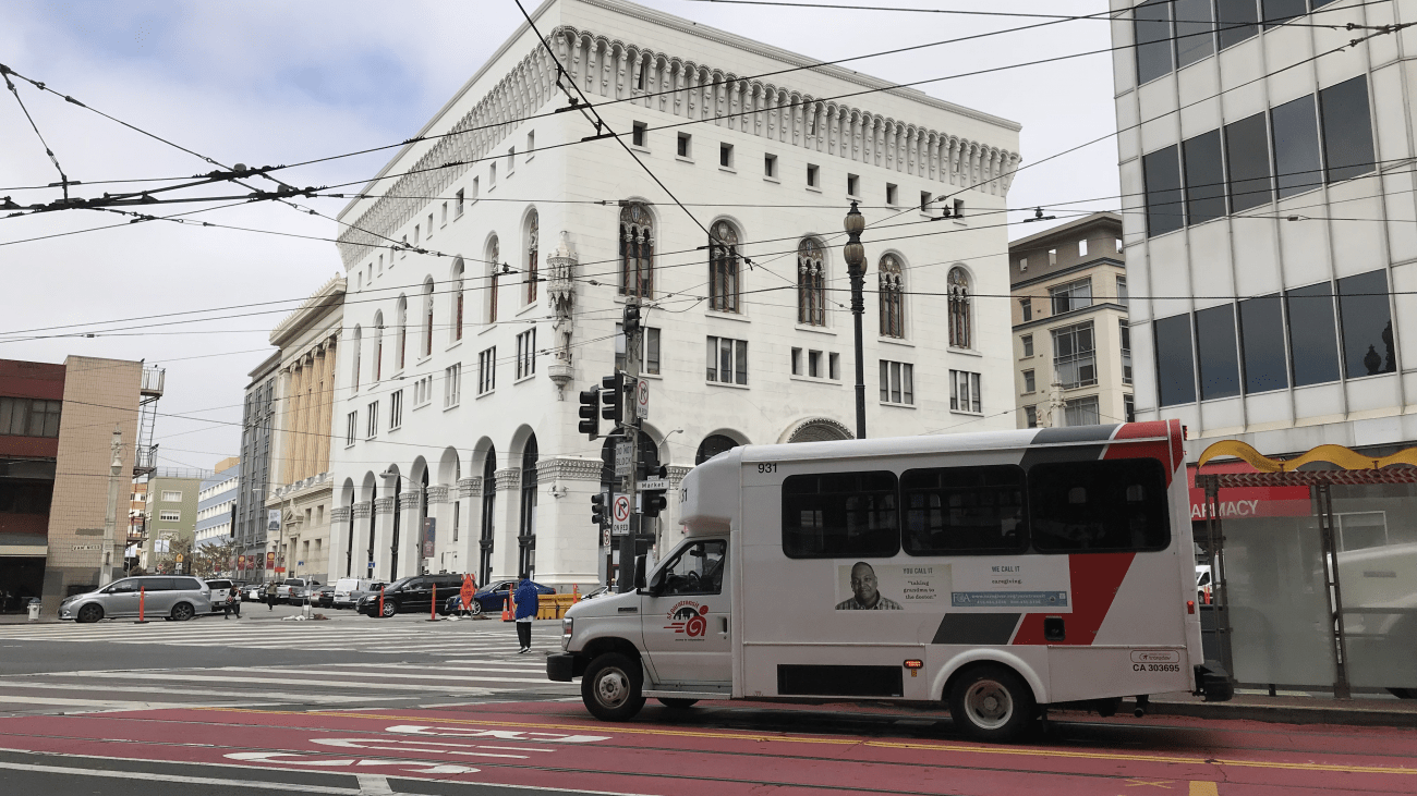 A paratransit vehicle on Market Street