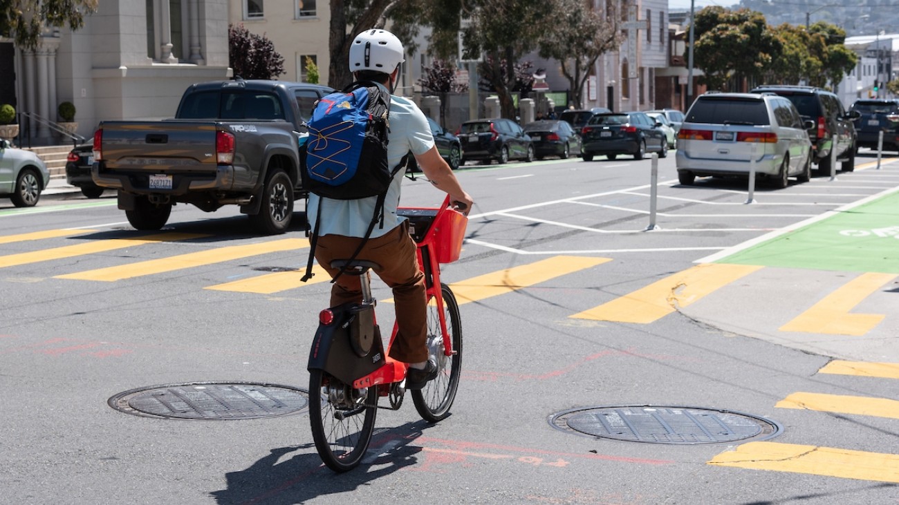 A person using New Bike Lanes on Howard Street