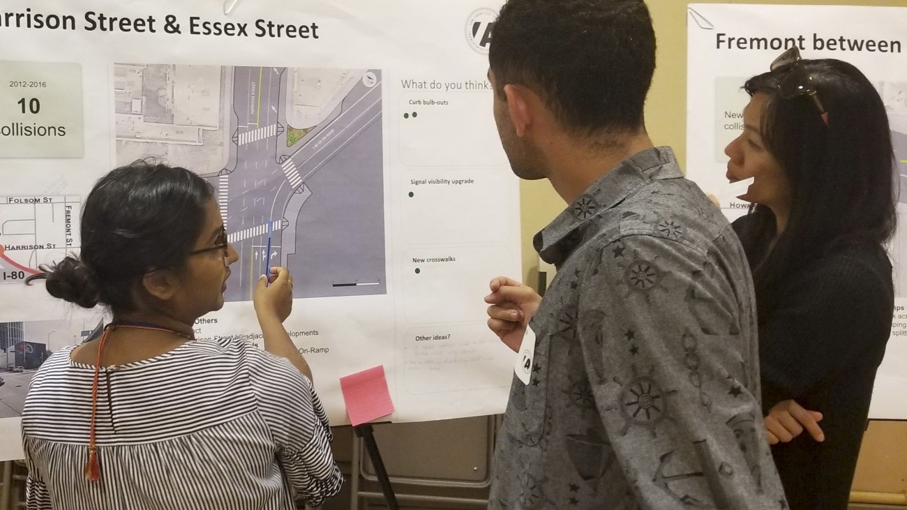 A Transportation Authority Planner conducts public outreach