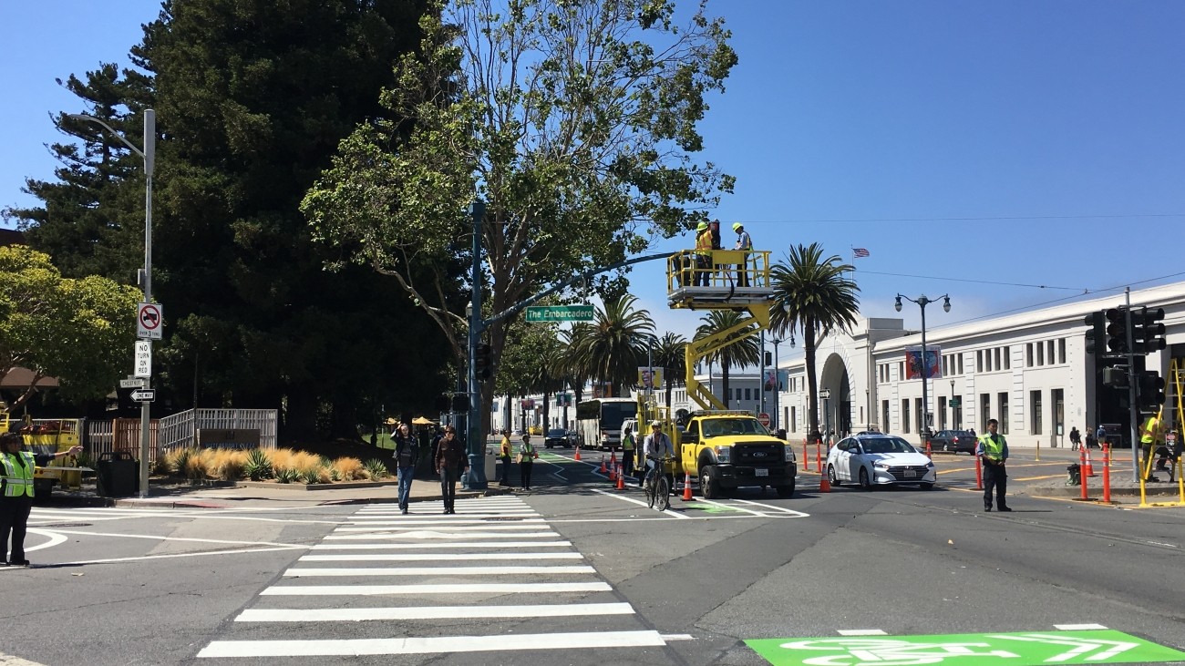 A crosswalk and bike lane with an improved paint job