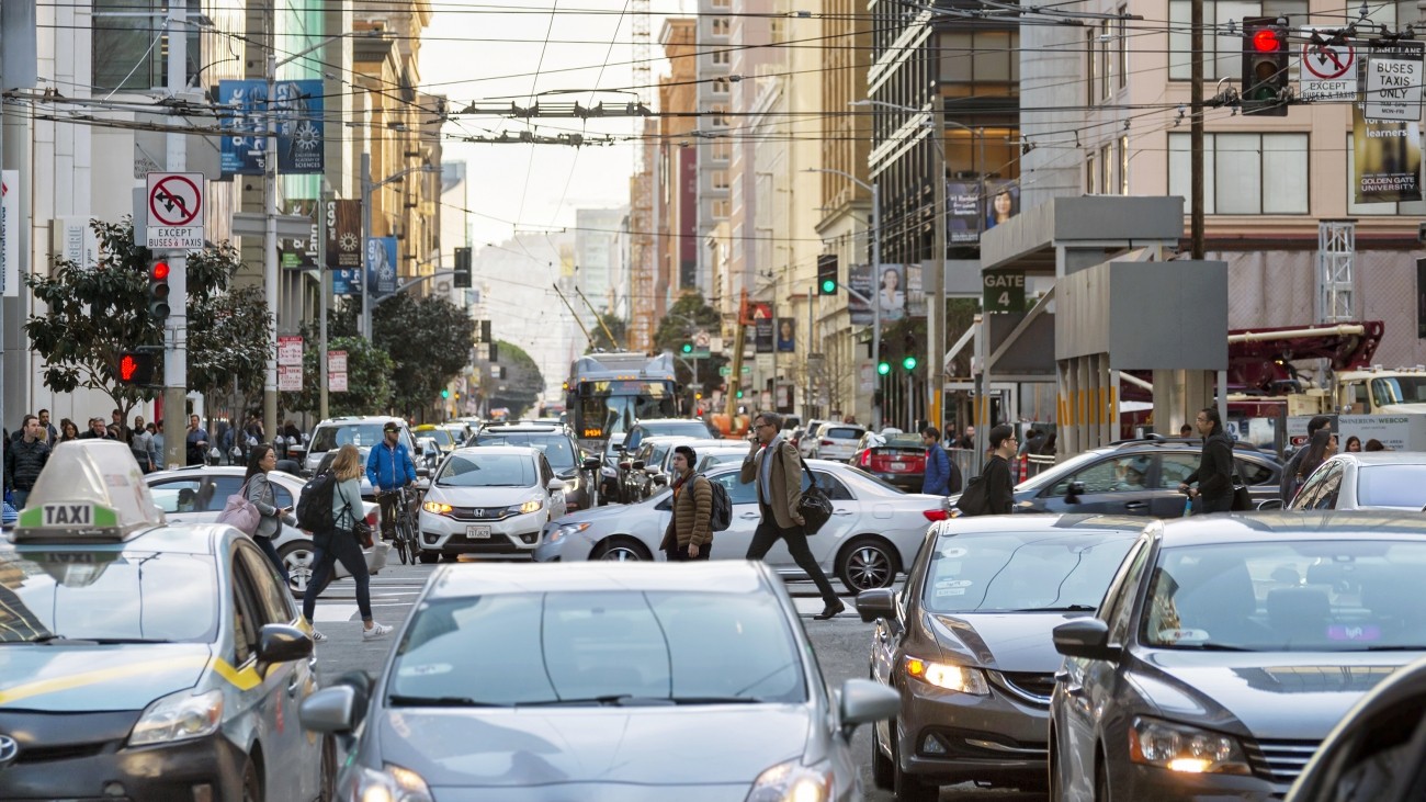 people walking in a congested street