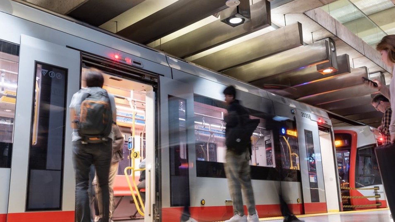 People boarding a muni train