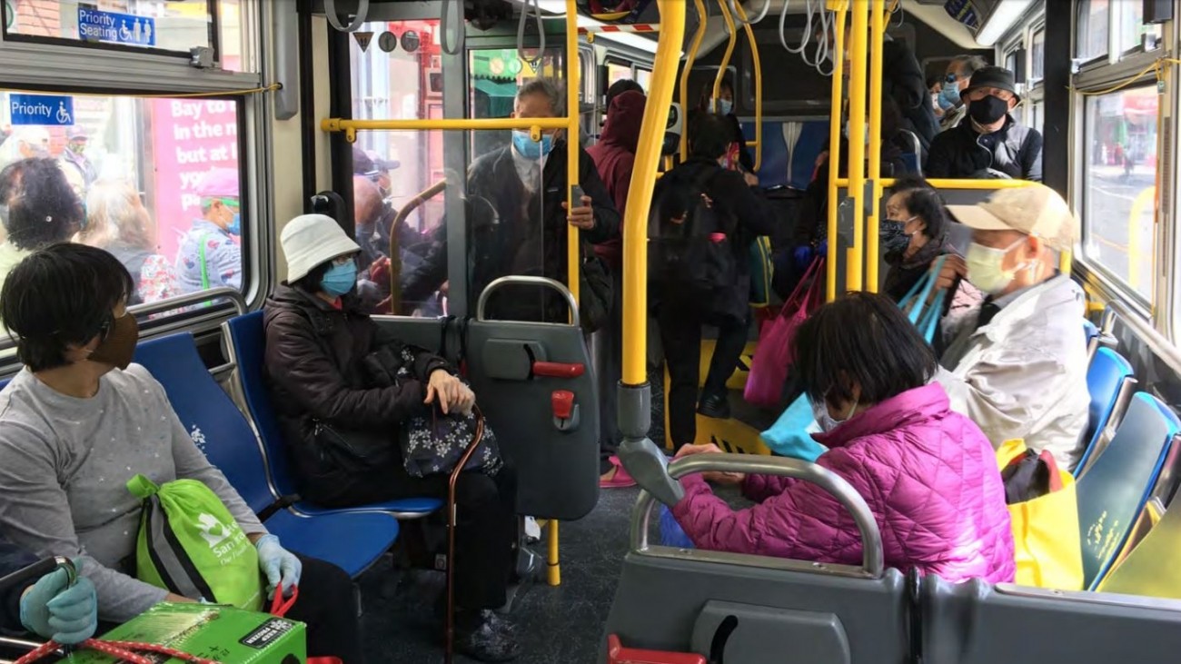 People riding a bus during shelter-in-place