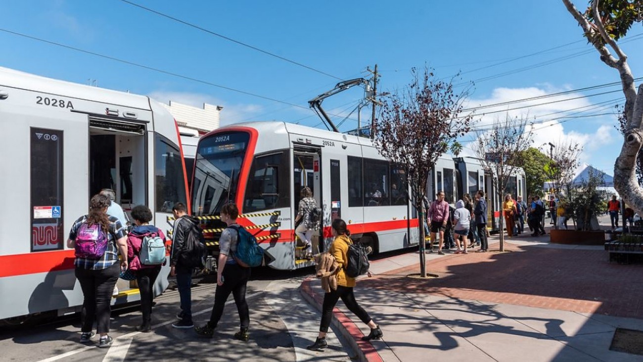 People boarding a muni train