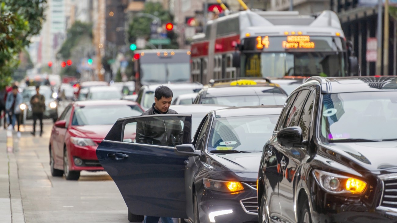 Person onboarding ride-hailing service vehicle