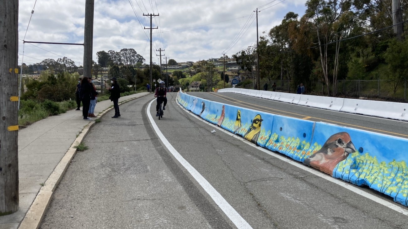 Protected bikeway in the Bayview with mural