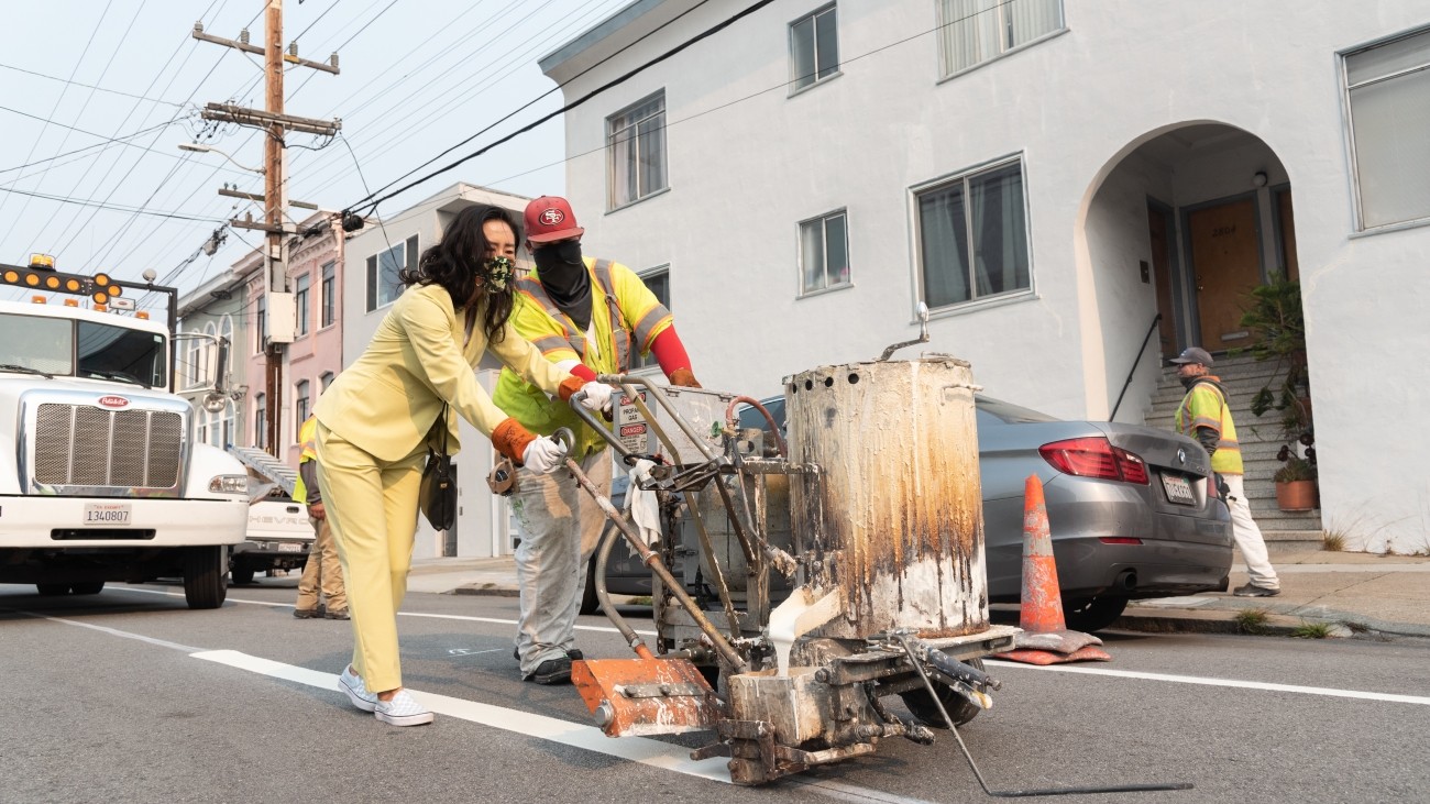 Transportation Authority Board Member Connie Chan and SFMTA staff working on Anza Bike Lanes project