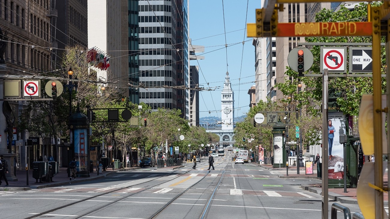 View of looking down Market Street with the Ferry Building in the distance