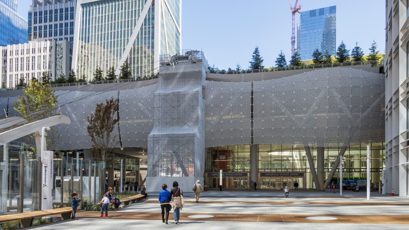 People walking in front of the Salesforce Transit Center