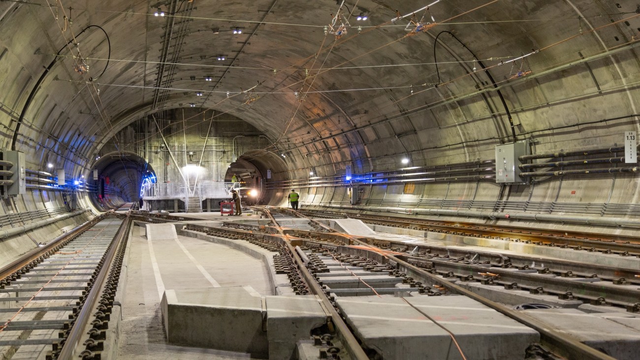 Photo of tracks entering two Central Subway tunnels