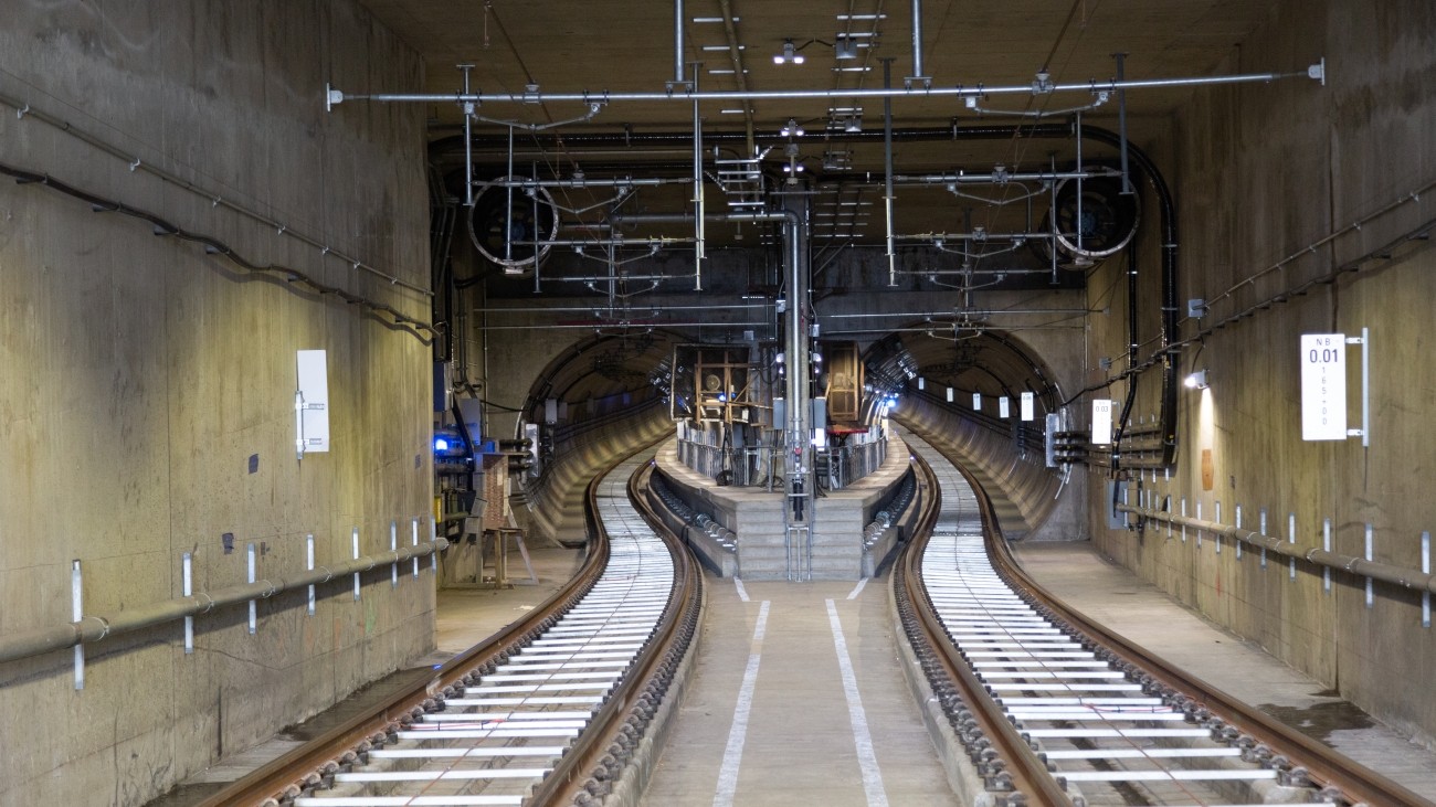 Photo of a pair of subway tracks in a tunnel