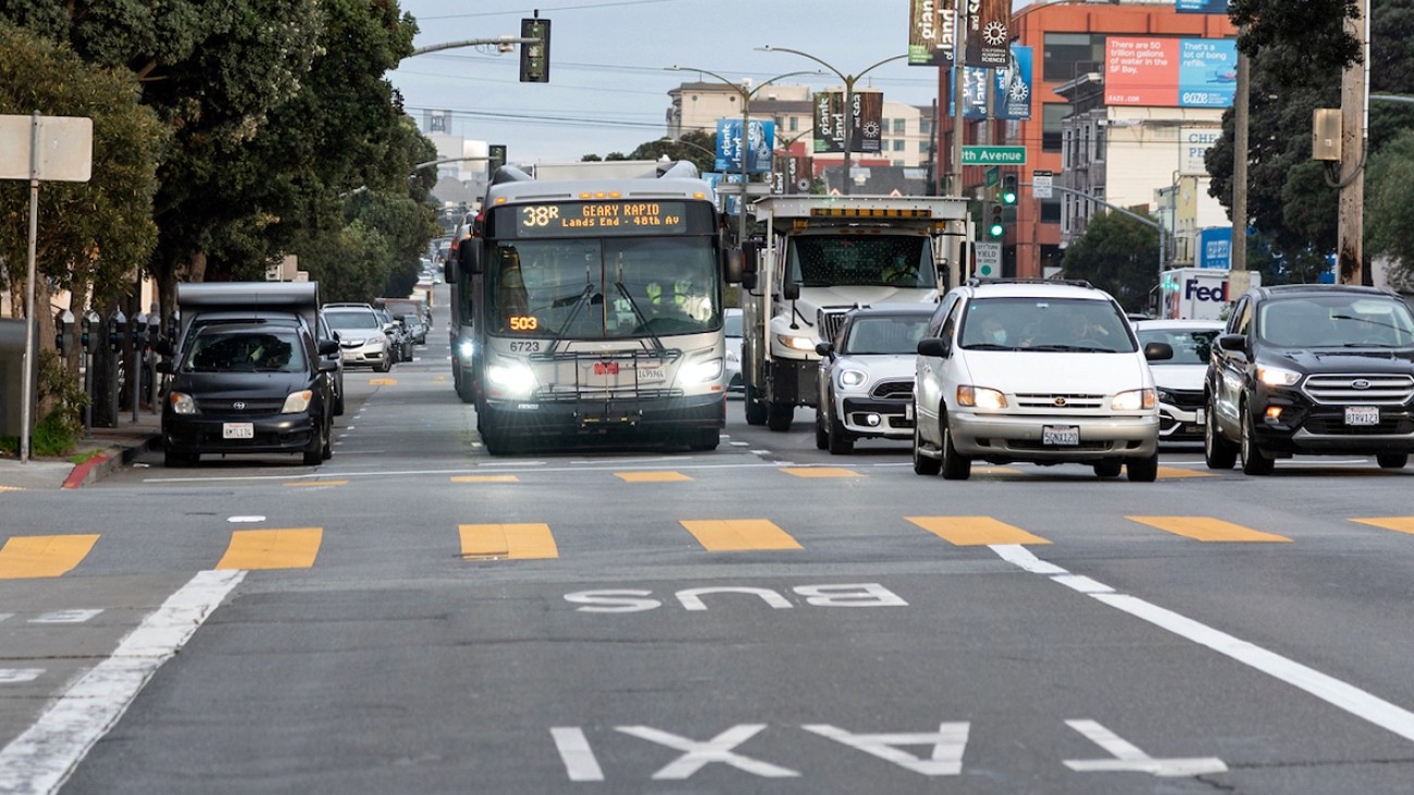 Buses and cars on Geary Blvd.