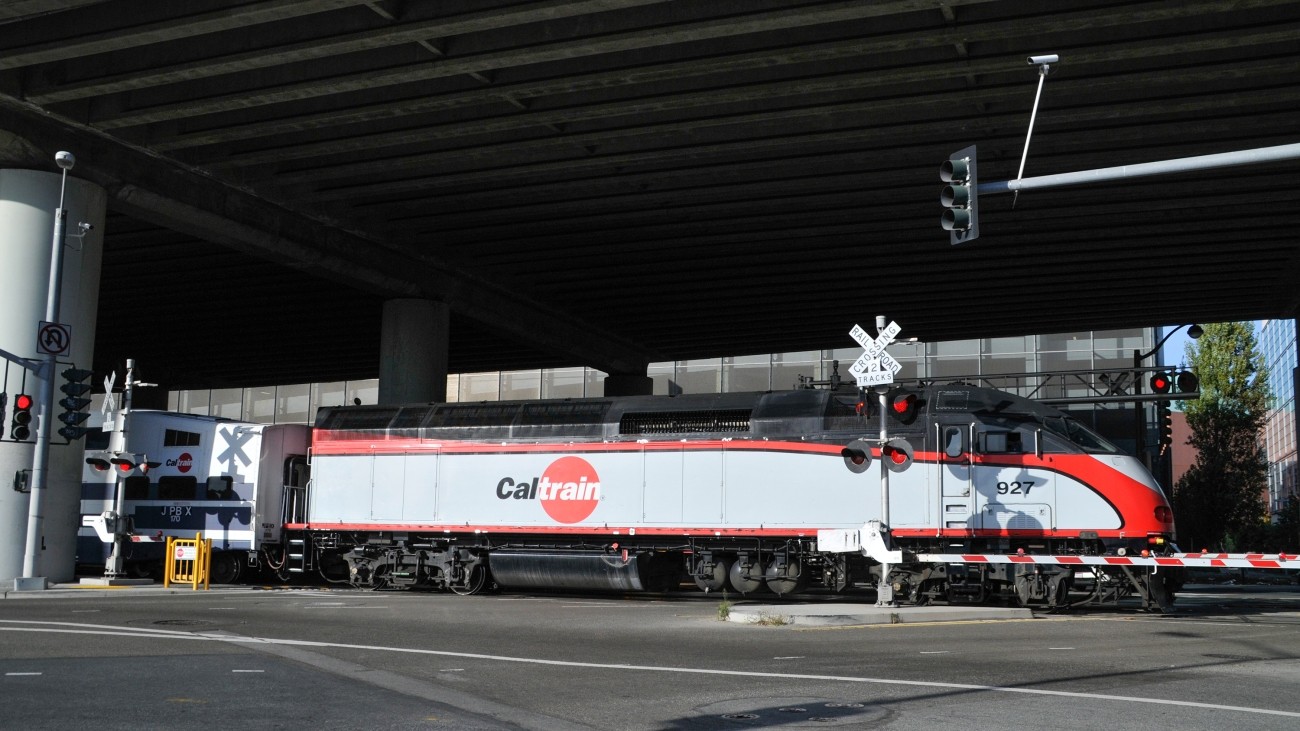 Caltrain train at a railroad crossing