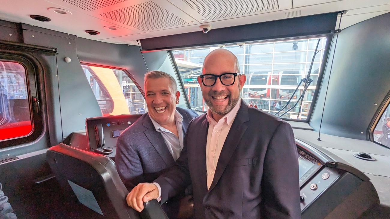 Dorsey and Chair at driver's seat of a new Caltrain electric trainset