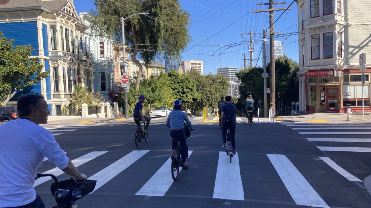 Tour group rides through the Wiggle.