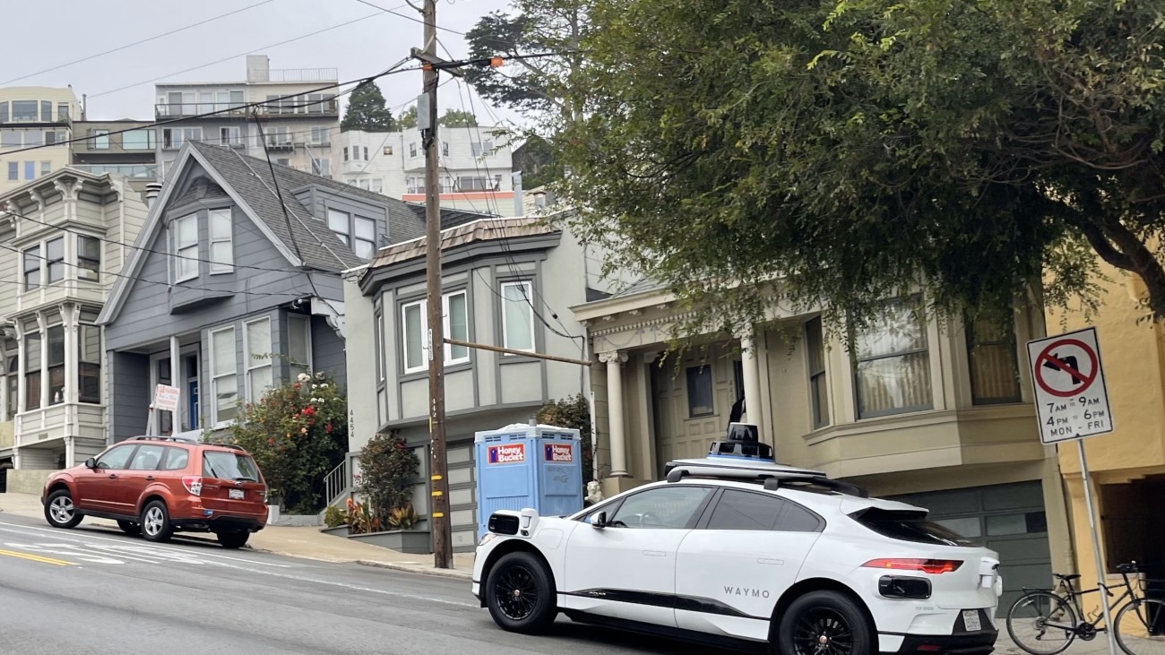 A driverless Waymo vehicle on a San Francisco street in Corona Heights neighborhood