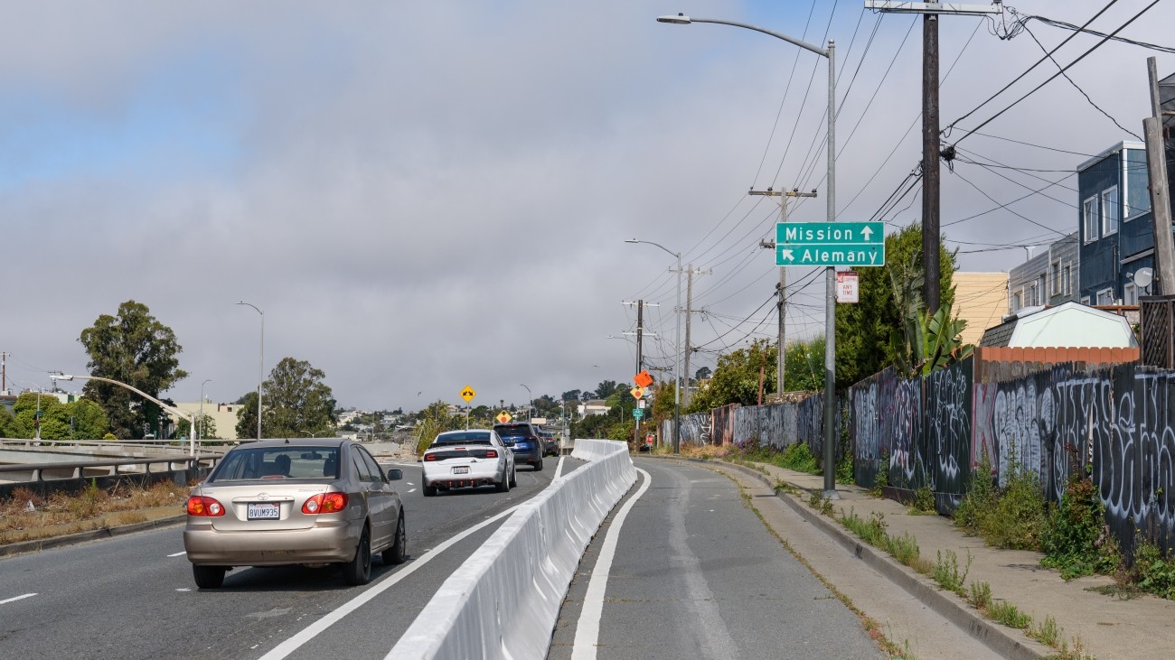 Protected bikeway barrier along Alemany Blvd