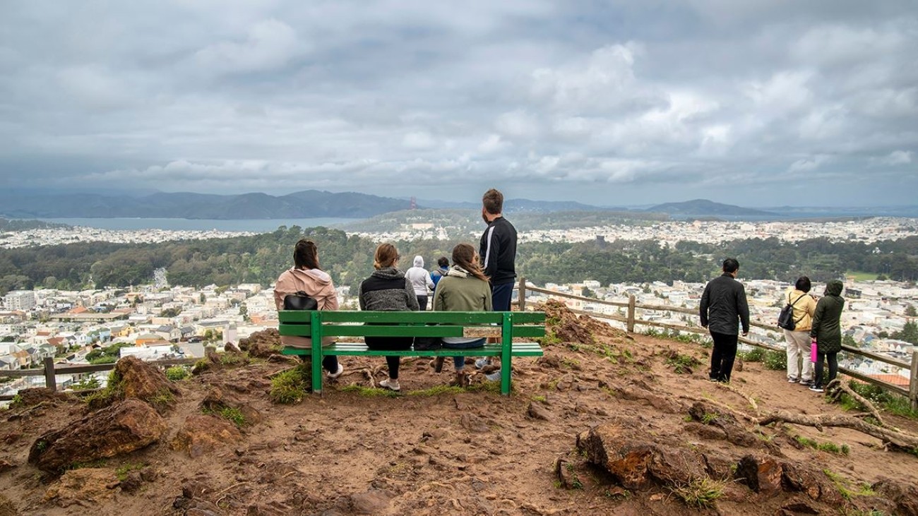 People sitting on a bench at Grandview Park