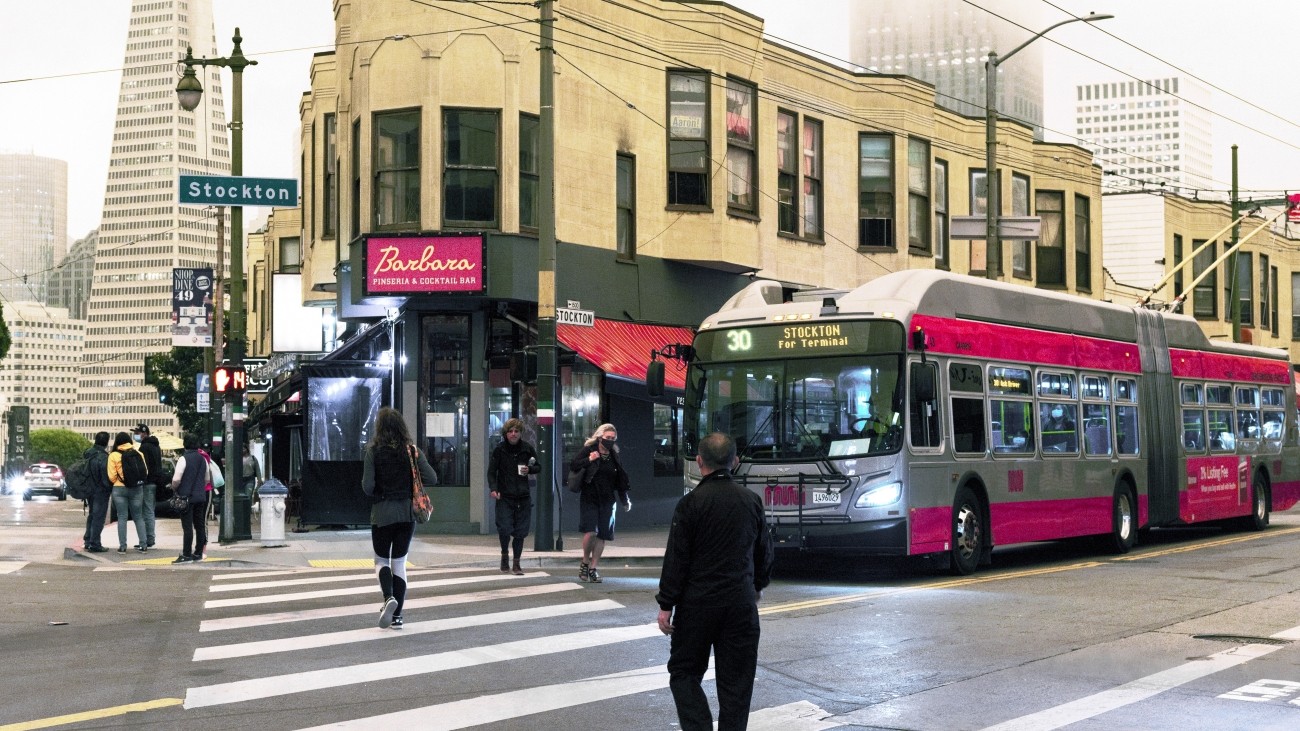 Pedestrians crossing at the intersection at Columbus, Green, and Stockton