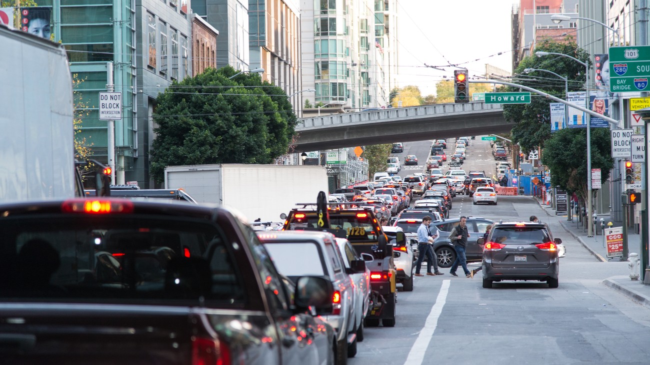 Many cars lined up on the road