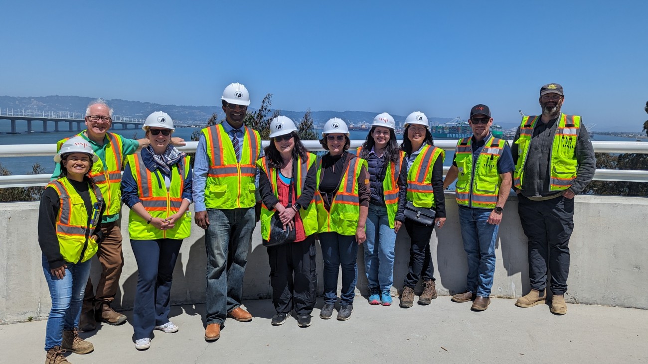 Group shot with East Span in the background