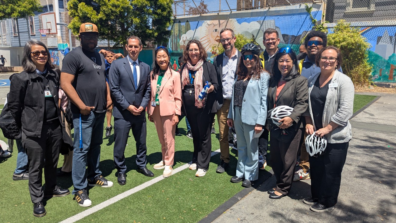 Various officials including Mayor Lurie, staff from SFCTA, SFMTA, WalkSF, Bike Coalition, SFUSD and more at Bike and Roll to School Week event