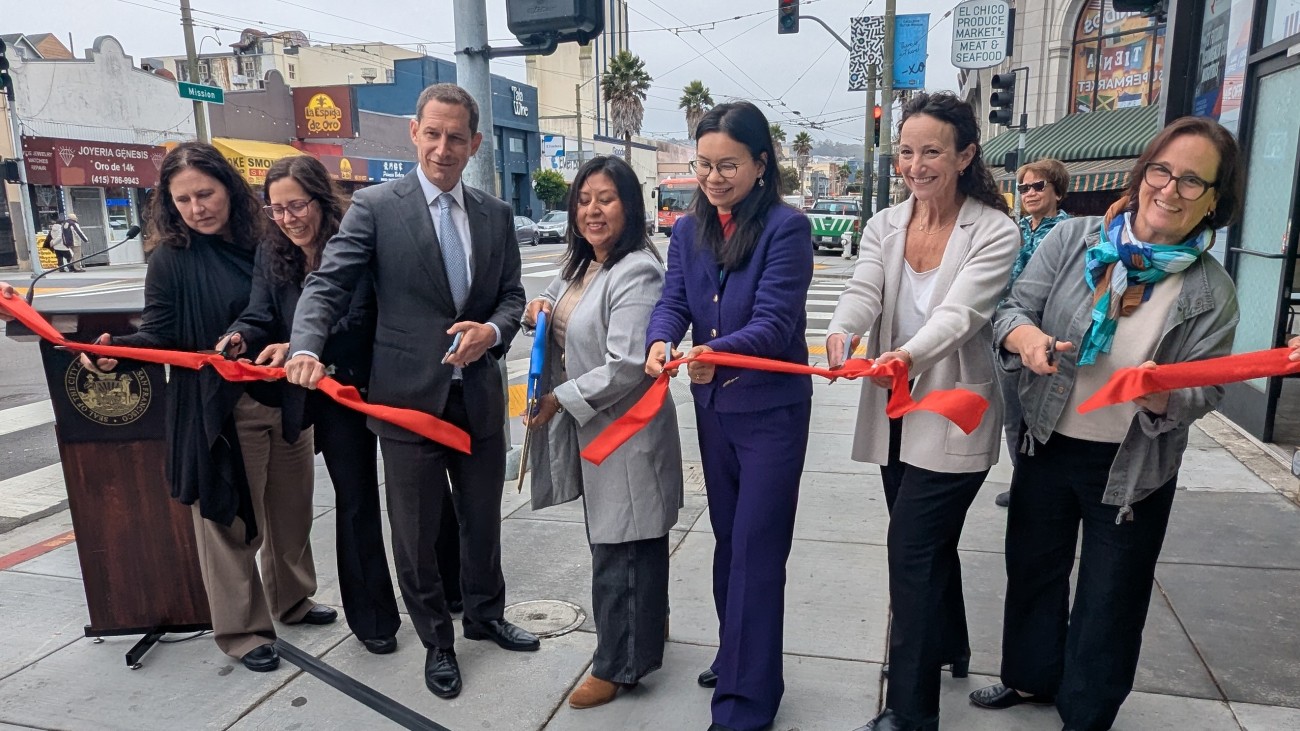 Group shot of ribbon cutting at the Mission & Norton streets intersection