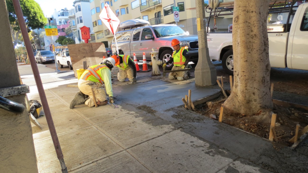SF Public Works team making sidewalk repairs 