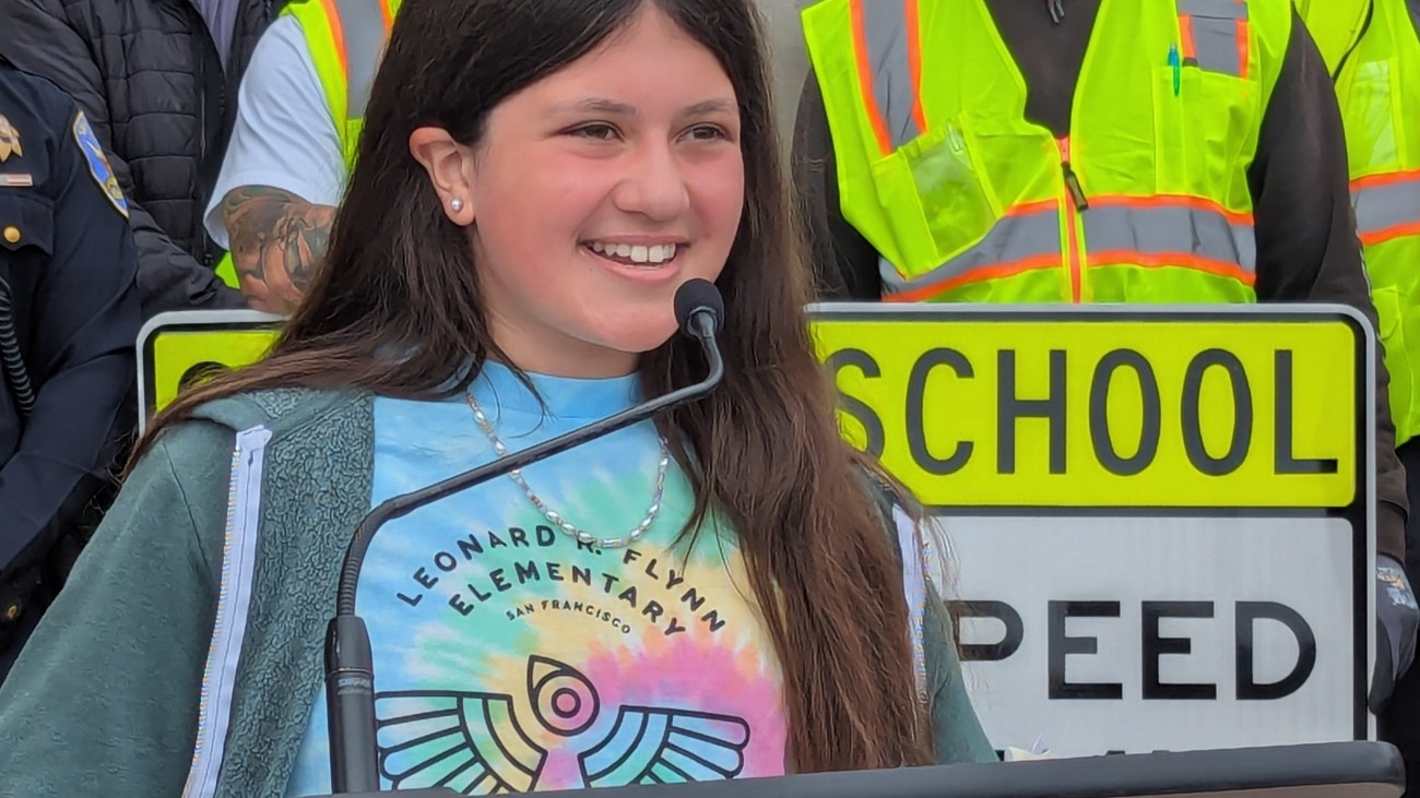 A student speaking at the back to school celebration 
