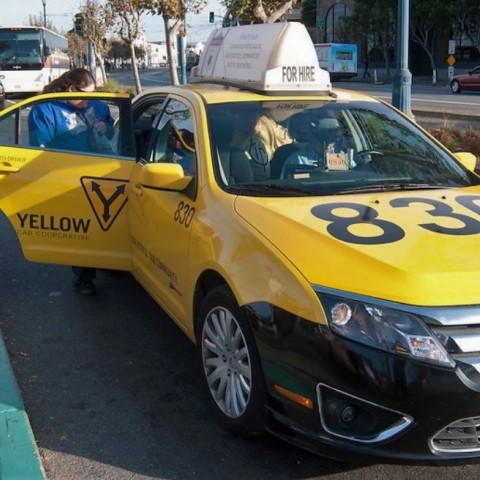 people entering a taxi