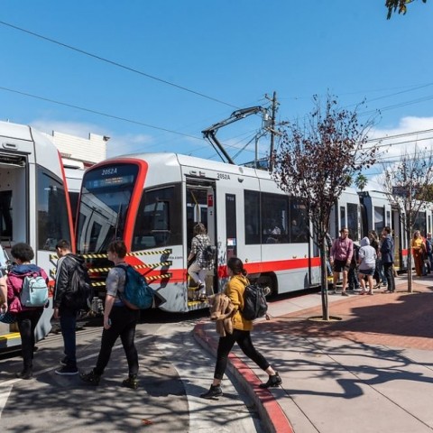 People boarding a muni train