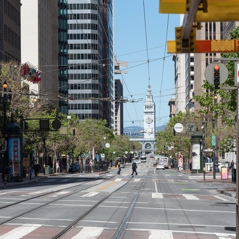 View of looking down Market Street with the Ferry Building in the distance