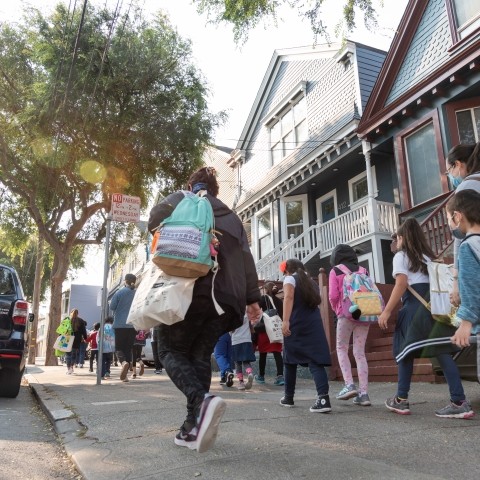 Students and parents walking to school