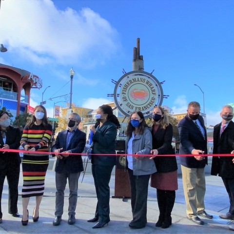 City officials, transportation agency staff, and community members gathered for the ribbon cutting ceremony at Fisherman's Wharf