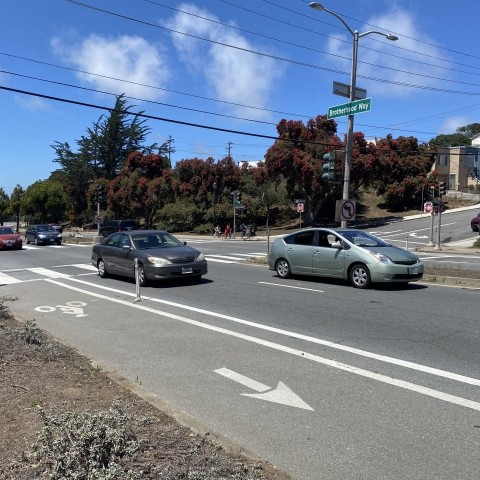 Vehicles driving along Brotherhood Way