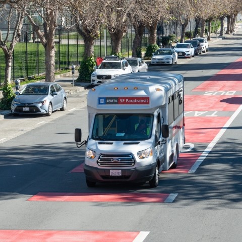 SF Paratransit bus along roadway in San Francisco