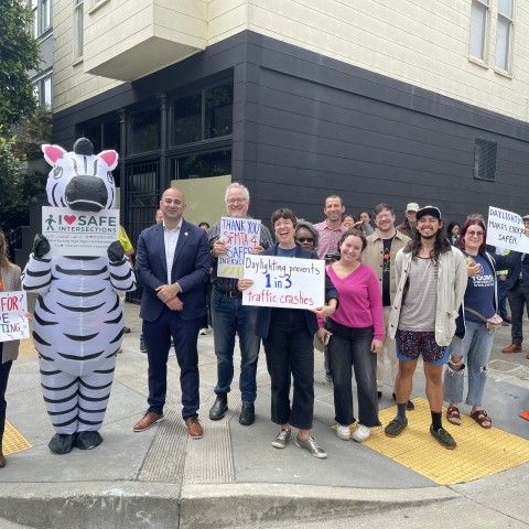 District 5 Transportation Authority Board Member Bilal Mahmood with community leaders and advocates, celebrating the kickoff of daylighting efforts
