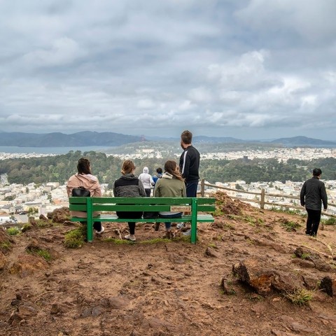 People sitting on a bench at Grandview Park